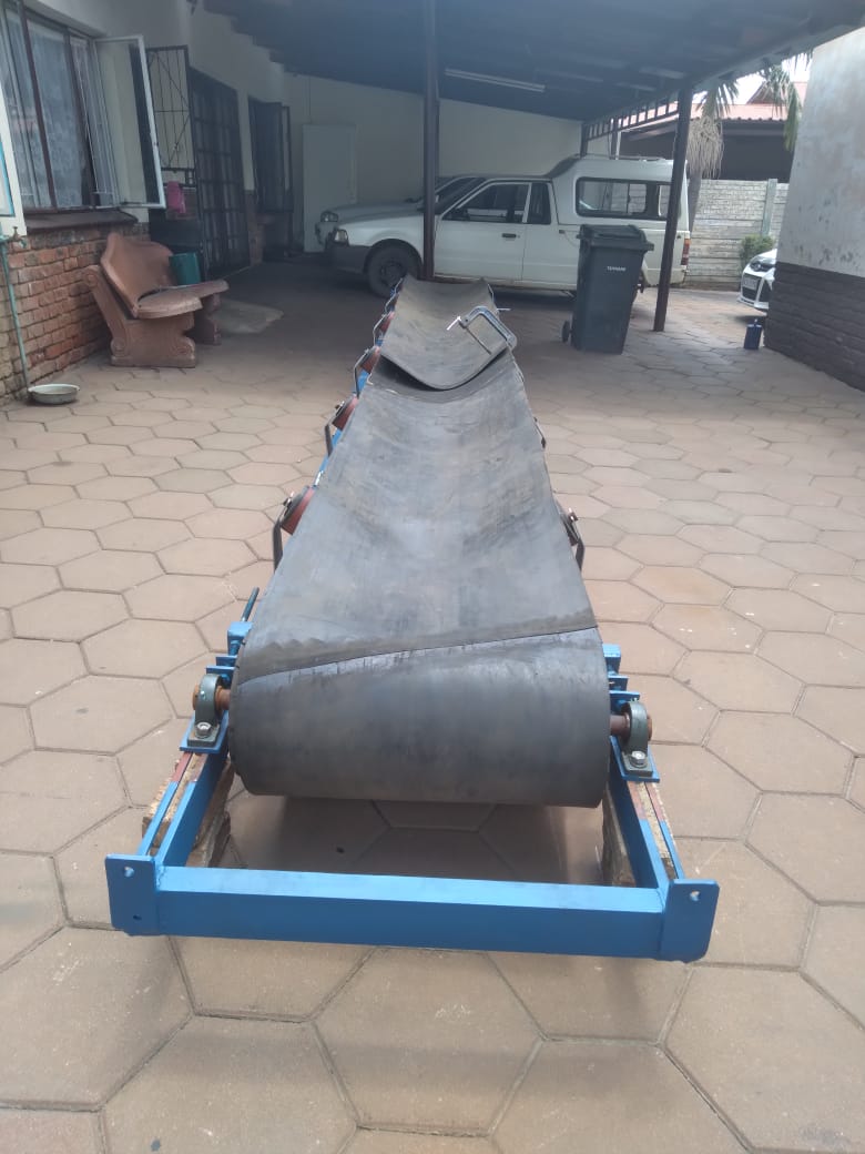 conveyor being repaired